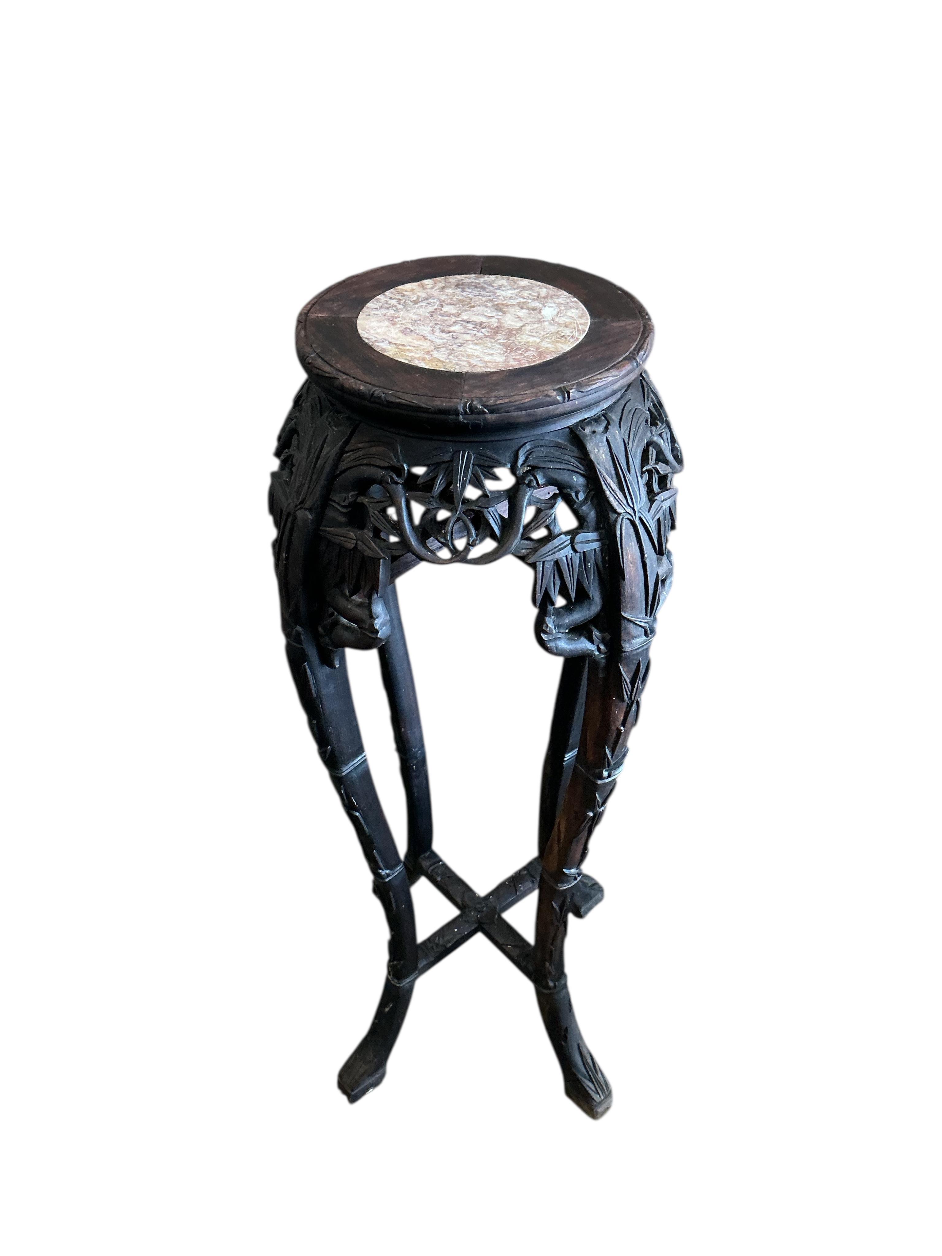 A Chinese carved hardwood marble top vase stand, height 92cm